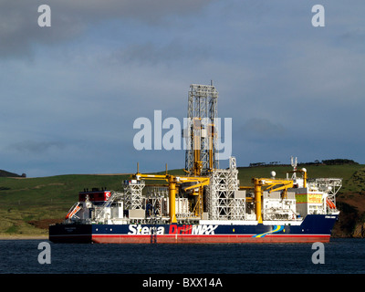 The Drillship Stena Carron leaving the Cromarty Firth, on  route to drill deepwater oil wells in the waters near Greenland. Stock Photo