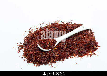 pile of Hot Red Chilli Chillies pepper, dried and crushed. Stock Photo