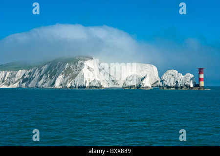 The Needles and Needles Lighthouse at the western end of Isle of Wight in Southern England Stock Photo