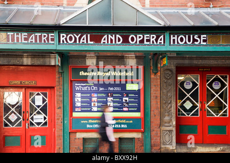 Blurred Figure Passing the Theatre Royal and Opera House Wakefield West Yorkshire England Stock Photo