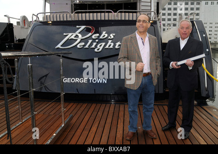 Billionaire tycoon Theo Paphitis member of the Dragon's Den team by his new yacht at the London Boat show, UK Stock Photo