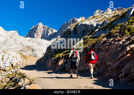 Walkers near the summit of the mountains at Fuente De in the Picos de Europa National Park in northern Spain Stock Photo