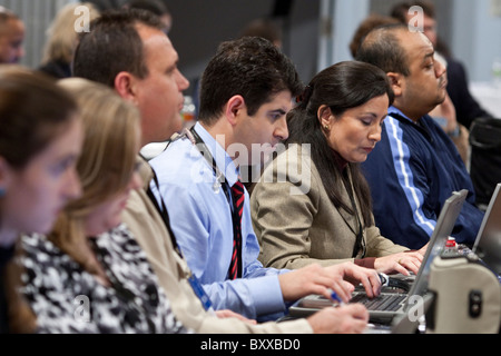 Journalists on press row cover a televised debate between candidates for governor of Texas at the University of North Texas Stock Photo