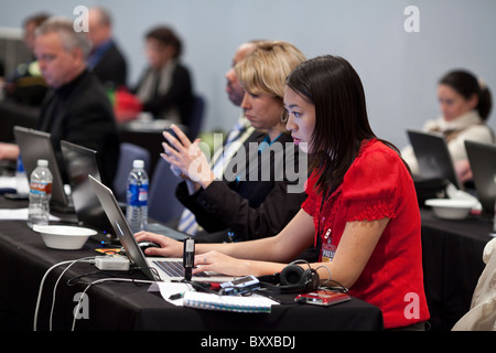 Journalists on press row cover a televised debate between candidates for governor of Texas at the University of North Texas Stock Photo
