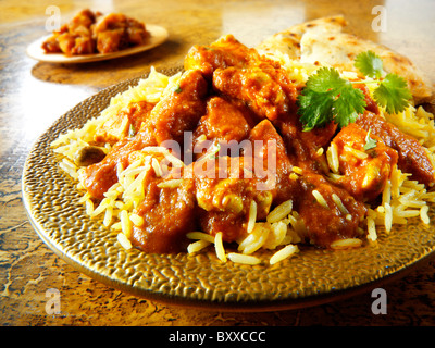 Chicken Madras woth Pilau rice & naan bread Stock Photo