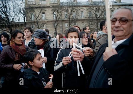 Paris, France, Large Crowd People, Coptic Christians Demonstrating, Rally, Terrorist Attacks in Egypt, Lighting Candles Protests on Street, religious Christian ACTIVISM Stock Photo