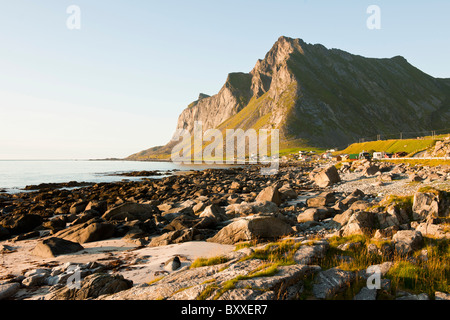 Low evening sun over the village Vikten by the open sea in Lofoten, North Norway Stock Photo