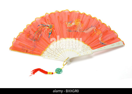 Open red Chinese folding fan with dragon and pheonix design on white background Stock Photo