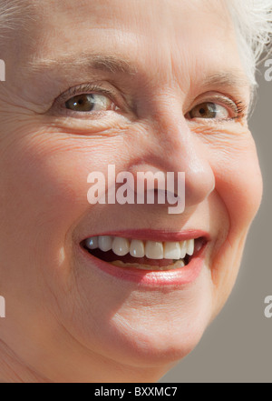 Close-up of senior woman smiling Stock Photo