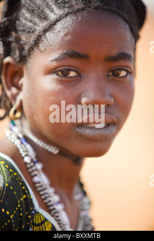 Portrait of a young Fulani woman in the town of Djibo in northern Burkina Faso, West Africa. Stock Photo