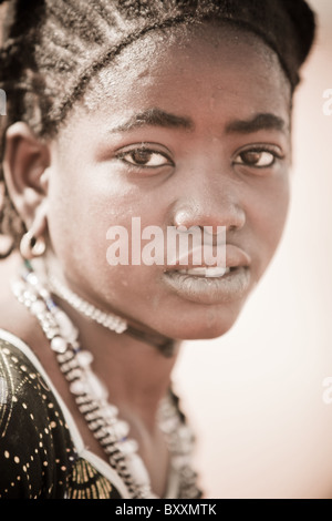 Portrait of a young Fulani woman in the town of Djibo in northern Burkina Faso, West Africa. Stock Photo