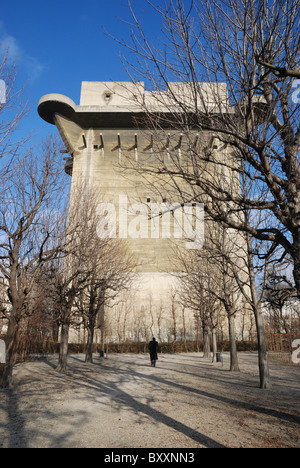 A WW2 Flak tower (the Flakturm VII L-tower) built by the Luftwaffe in Augarten park, Vienna, Austria. Stock Photo