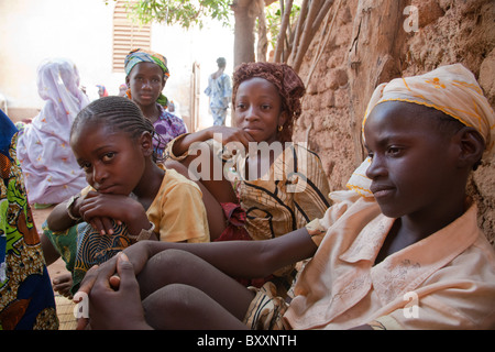 Girls attend a Fulani 'bantule' in the town of Djibo in northern Burkina Faso, when the bride moves into the groom's home. Stock Photo