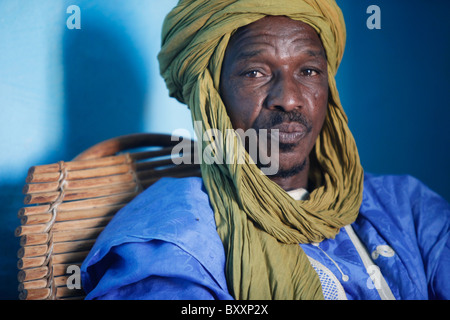 In West Africa, a griot in northern Burkina Faso recites family histories through poetry, song, and music. Stock Photo