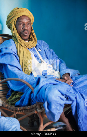 In West Africa, a griot in northern Burkina Faso recites family histories through poetry, song, and music. Stock Photo