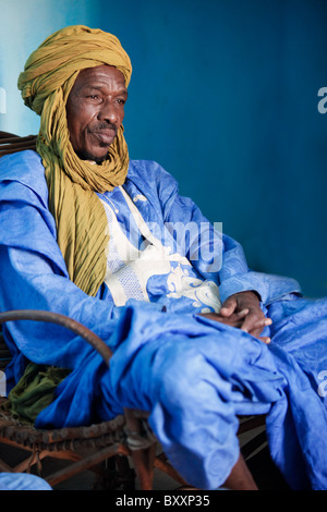 In West Africa, a griot in northern Burkina Faso recites family histories through poetry, song, and music. Stock Photo