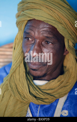 In West Africa, a griot in northern Burkina Faso recites family histories through poetry, song, and music. Stock Photo