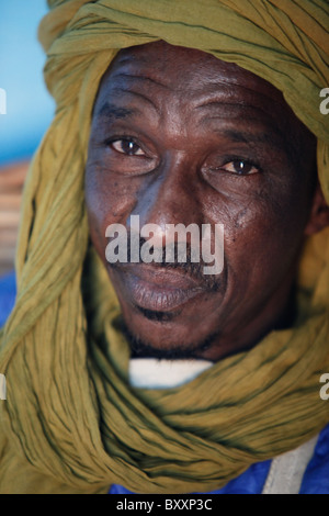 In West Africa, a griot in northern Burkina Faso recites family histories through poetry, song, and music. Stock Photo