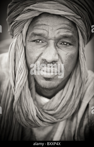 In West Africa, a griot in northern Burkina Faso recites family histories through poetry, song, and music. Stock Photo