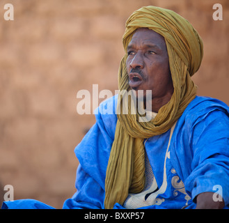 In West Africa, a griot in northern Burkina Faso recites family histories through poetry, song, and music. Stock Photo