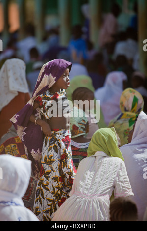 On the morning of Tabaski, men, women, and children alike converge on the great mosque of Djibo in northern Burkina Faso. Stock Photo