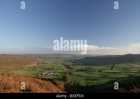 A view down Fryup Dale towards the Esk Valley in early morning with long shadows, North York Moors. Stock Photo