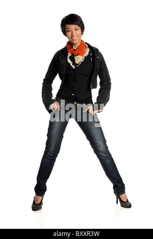 Portrait of young Asian American woman standing isolated over white background Stock Photo