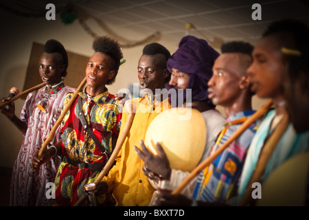 In the town of Djibo in northern Burkina Faso, Fulani 'doohoobe' (people who sing 'doohaali') dance in traditional fashion. Stock Photo