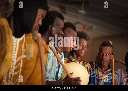 In the town of Djibo in northern Burkina Faso, Fulani 'doohoobe' (people who sing 'doohaali') dance in traditional fashion. Stock Photo