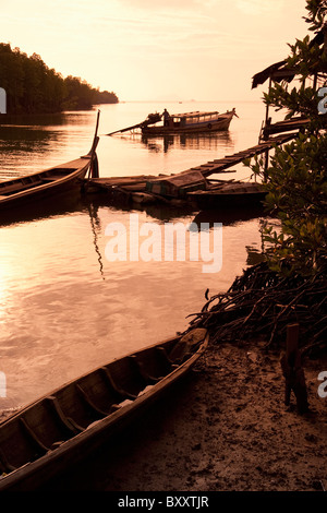 Traditional Fishing Boats setting sail at Dawn, Bangrong, Ko Phuket, Thailand, Southeast Asia Stock Photo