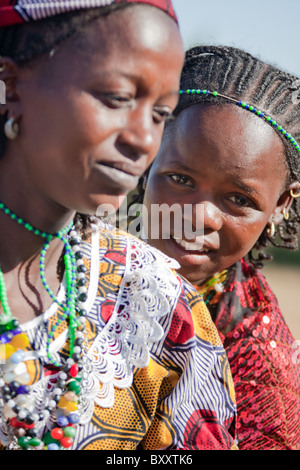 Young Fulani women in the seasonal village of Bantagiri in northern Burkina Faso.  The Fulani are nomadic pastoralists. Stock Photo