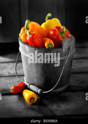 Mixed red, yellow & orange fresh bell peppers photos, pictures & images Stock Photo