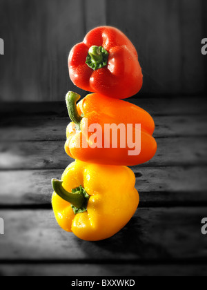 Mixed red, yellow & orange fresh bell peppers photos, pictures & images Stock Photo