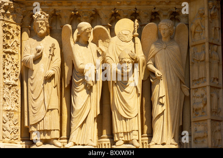 Close up of the Gothic statues on the facade of Notre Dame Cathedral Paris