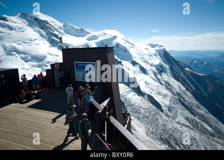 Aiguille du Midi viewing platform at 3842 m with Mont Maudit and Mont Blanc in the distance. Near Chamonix, French Alps. Stock Photo