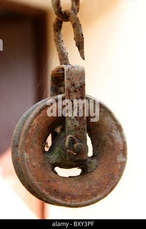 old water well pulley Stock Photo