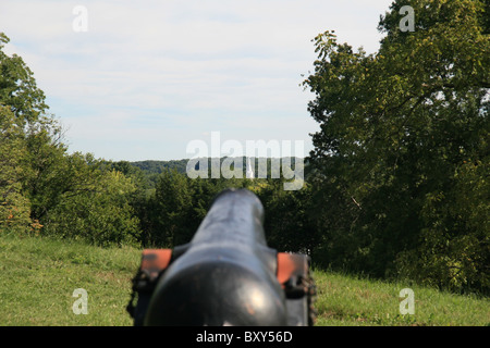 View over an American Civil War cannon towards church spire in Fredericksburg, Virginia viewed from Willis Hill. Stock Photo