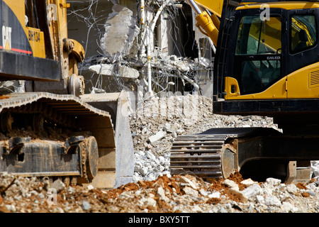 A bulldozer & a high reach excavator at the site of the old Towers dorm rooms on the USC campus in Columbia, SC in March of 2007 Stock Photo