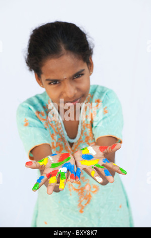 Children hands with yellow and blue color pencil drawing 