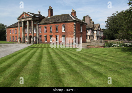 Adlington Hall & Gardens, England. Late summer view of the lawn and south front Georgian exterior of Adlington Hall. Stock Photo