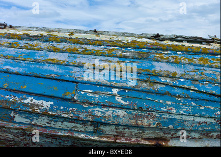 Faded aquamarine paint colour of a dilapidated fishing boat, County Clare, West Coast of Ireland Stock Photo
