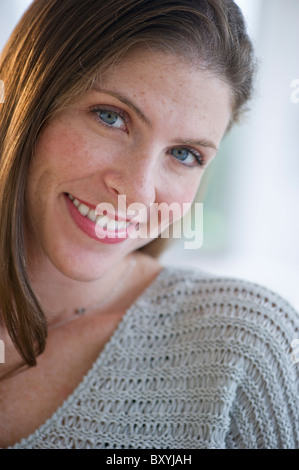 Portrait of smiling woman Stock Photo