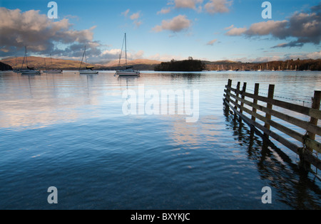 Evening light on a tranquil Lake Windermere in the Lake District, Cumbria England Stock Photo