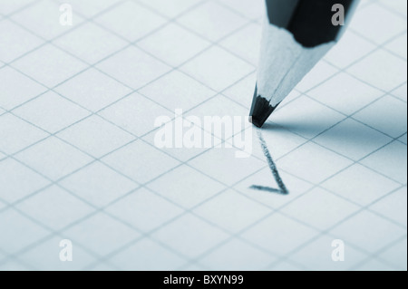 pencil writing a mark. Abstract concept Stock Photo