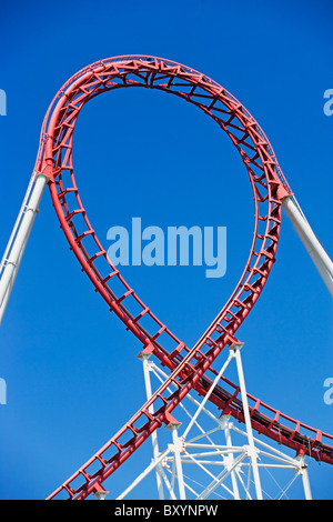 Rollercoaster against blue sky Stock Photo