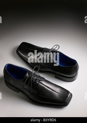 A studio photo of black walking shoes Stock Photo - Alamy
