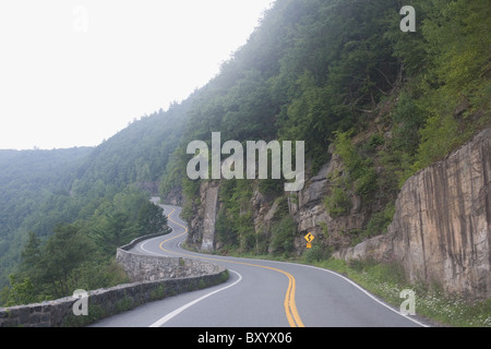 Winding road through mountains Stock Photo