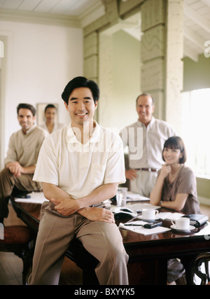 Colleagues in conference room Stock Photo