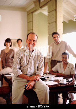 Colleagues in conference room Stock Photo
