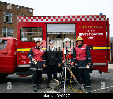 London Fire Investigation Unit in England in Great Britain in the United Kingdom UK. Work Occupation Profession Fireman Firemen Stock Photo